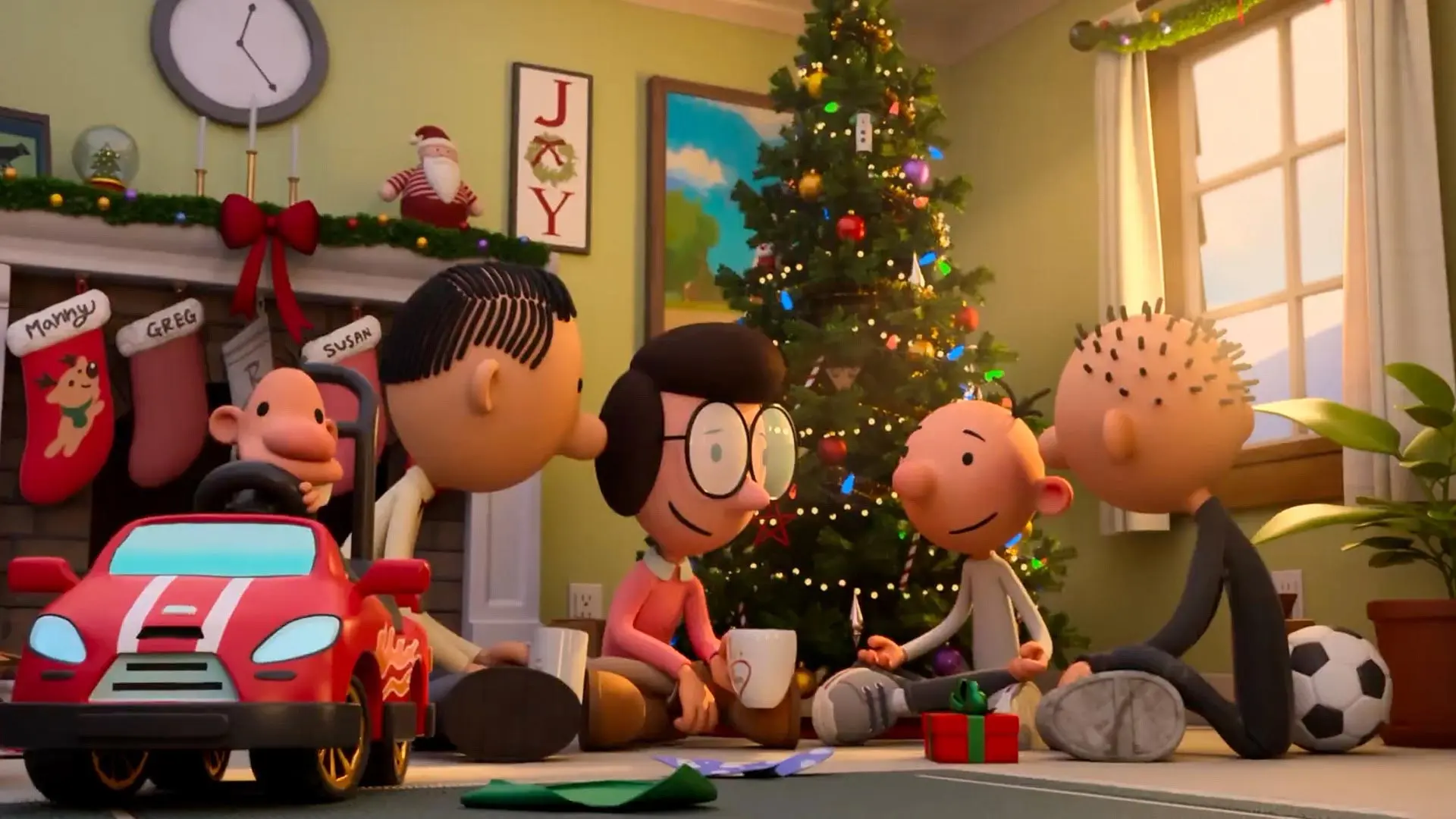 چند کودک و والدینشان در کنار درخت کریسمس در انیمیشن خاطرات یک بی عرضه